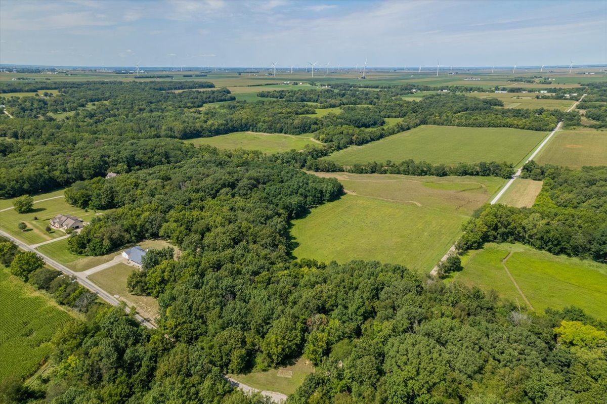 5897 Country Meadow Lane Clinton, IL 61727 - Photo 47 of 59 an aerial view of a houses with a yard
