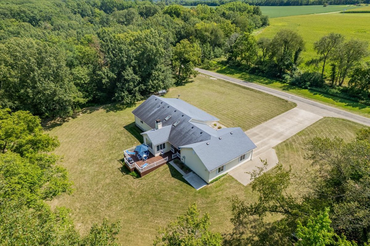 5897 Country Meadow Lane Clinton, IL 61727 - Photo 52 of 59 an aerial view of a house with swimming pool and garden