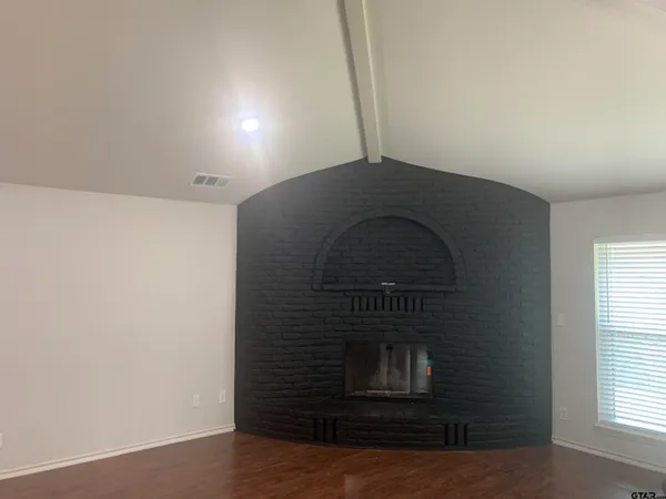 a living room with a fireplace