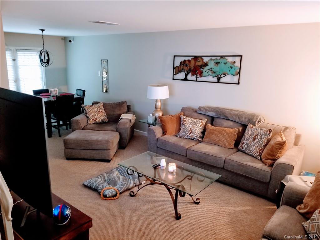 848 McAlway Road Charlotte, NC 28211 - Photo 2 of 9 a living room with furniture and a flat screen tv