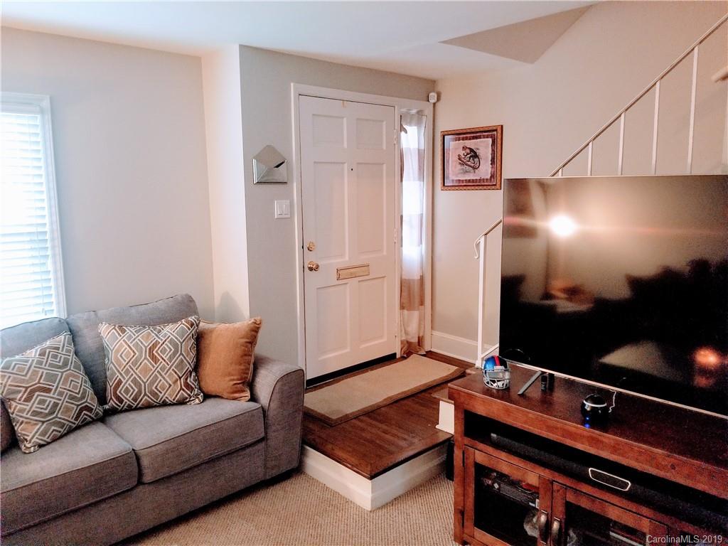 848 McAlway Road Charlotte, NC 28211 - Photo 4 of 9 a living room with furniture and a flat screen tv