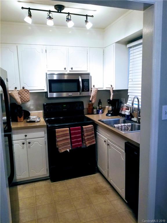 848 McAlway Road Charlotte, NC 28211 - Photo 5 of 9 a kitchen with a sink and cabinets