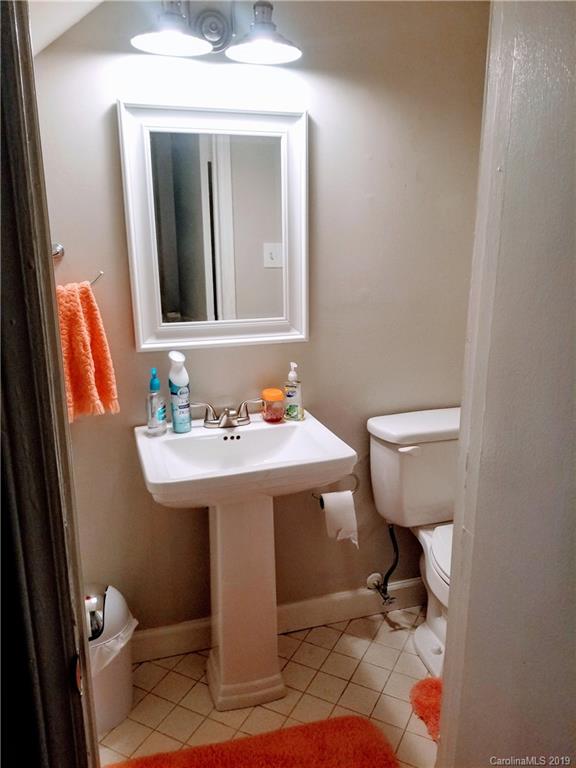 848 McAlway Road Charlotte, NC 28211 - Photo 7 of 9 a bathroom with a sink toilet and mirror