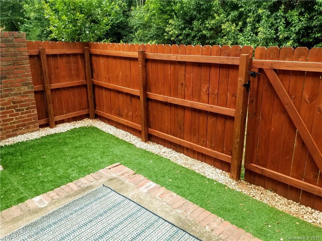 848 McAlway Road Charlotte, NC 28211 - Photo 8 of 9 a view of a backyard with wooden fence