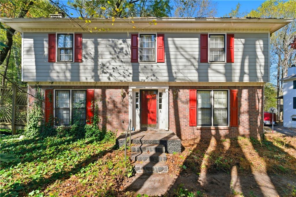 4587 Gilhams Road Roswell, GA 30075 - Photo 1 of 1 a view of tall brick building