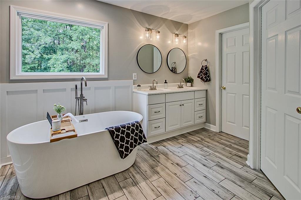 4398 Hoover Hill Road Trinity, NC 27370 - Photo 19 of 38 Soaker tub, walk-in closets and double vanity