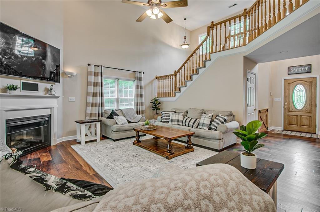 4398 Hoover Hill Road Trinity, NC 27370 - Photo 5 of 38 Hardwood floors and fireplace
