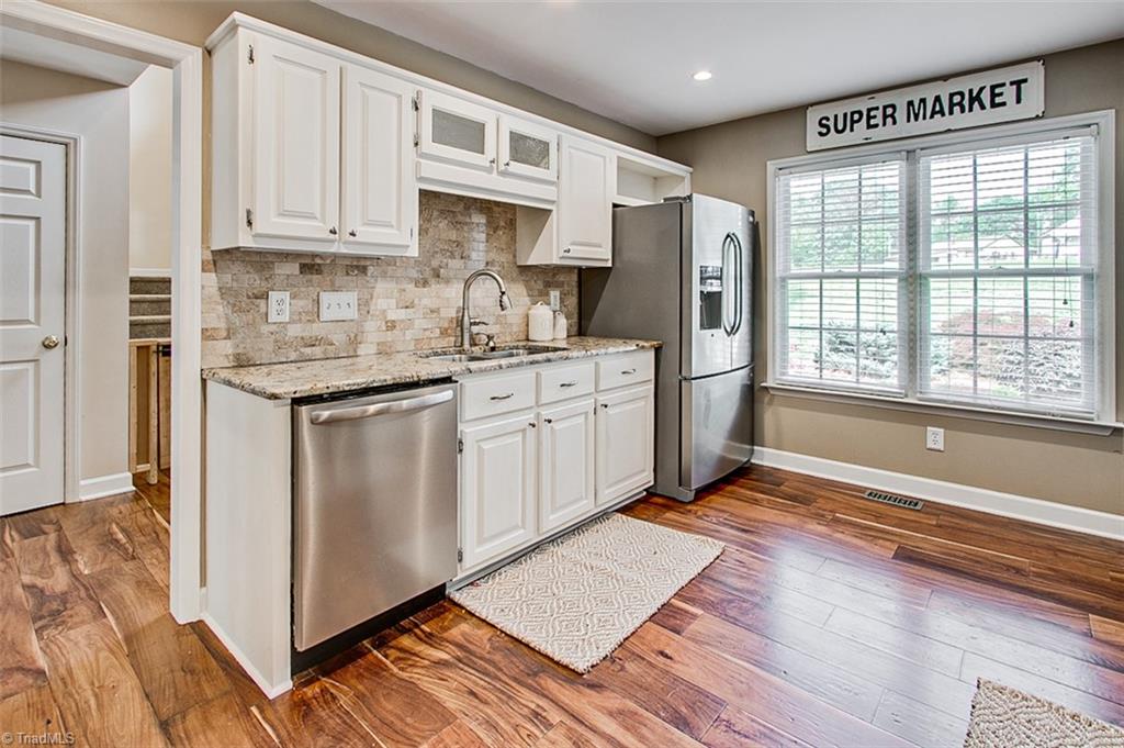 4398 Hoover Hill Road Trinity, NC 27370 - Photo 9 of 38 Stainless steel appliances. Refrigerator remains.