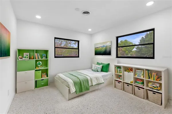 a view of empty room with windows