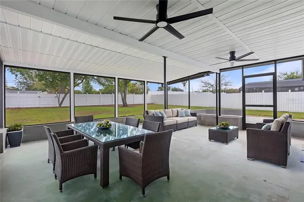 a view of an empty room with sliding glass door