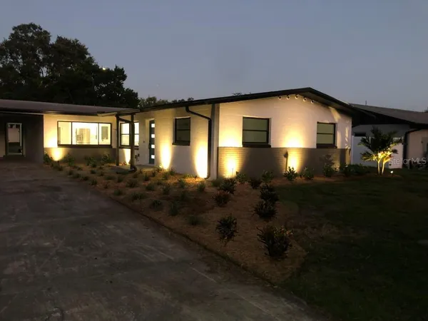 a house view with a outdoor space