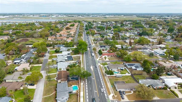 aerial view of a house with a garden