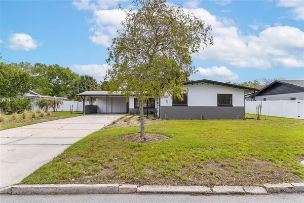 a swimming pool with wooden fence