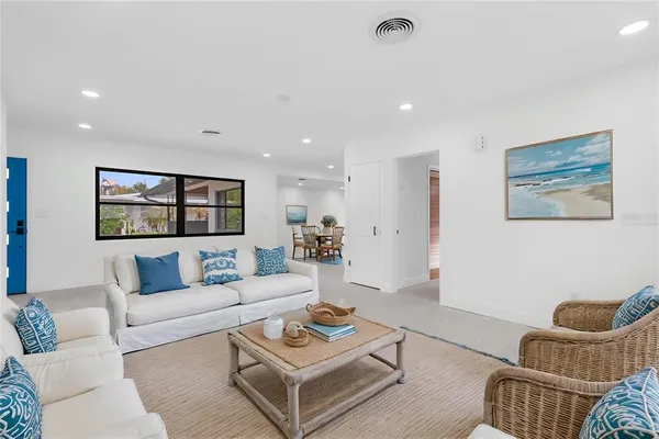 a living room with furniture and a couch