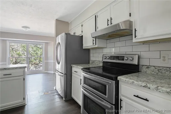 a bathroom with a sink and toilet