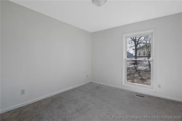 a view of small space with racks on the wall