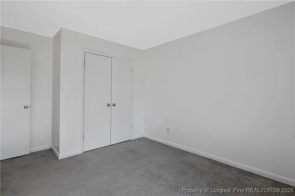 a bathroom with a sink vanity and a mirror