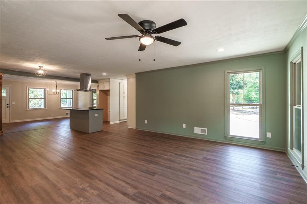 2635 Preston Road Good Hope, GA 30641 - Photo 12 of 68 a view of empty room with wooden floor and window
