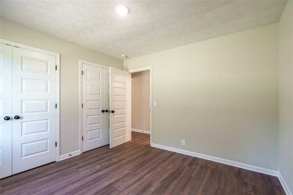 2635 Preston Road Good Hope, GA 30641 - Photo 31 of 68 a view of an empty room and wooden floor