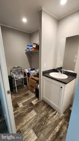 a kitchen with sink refrigerator and stove