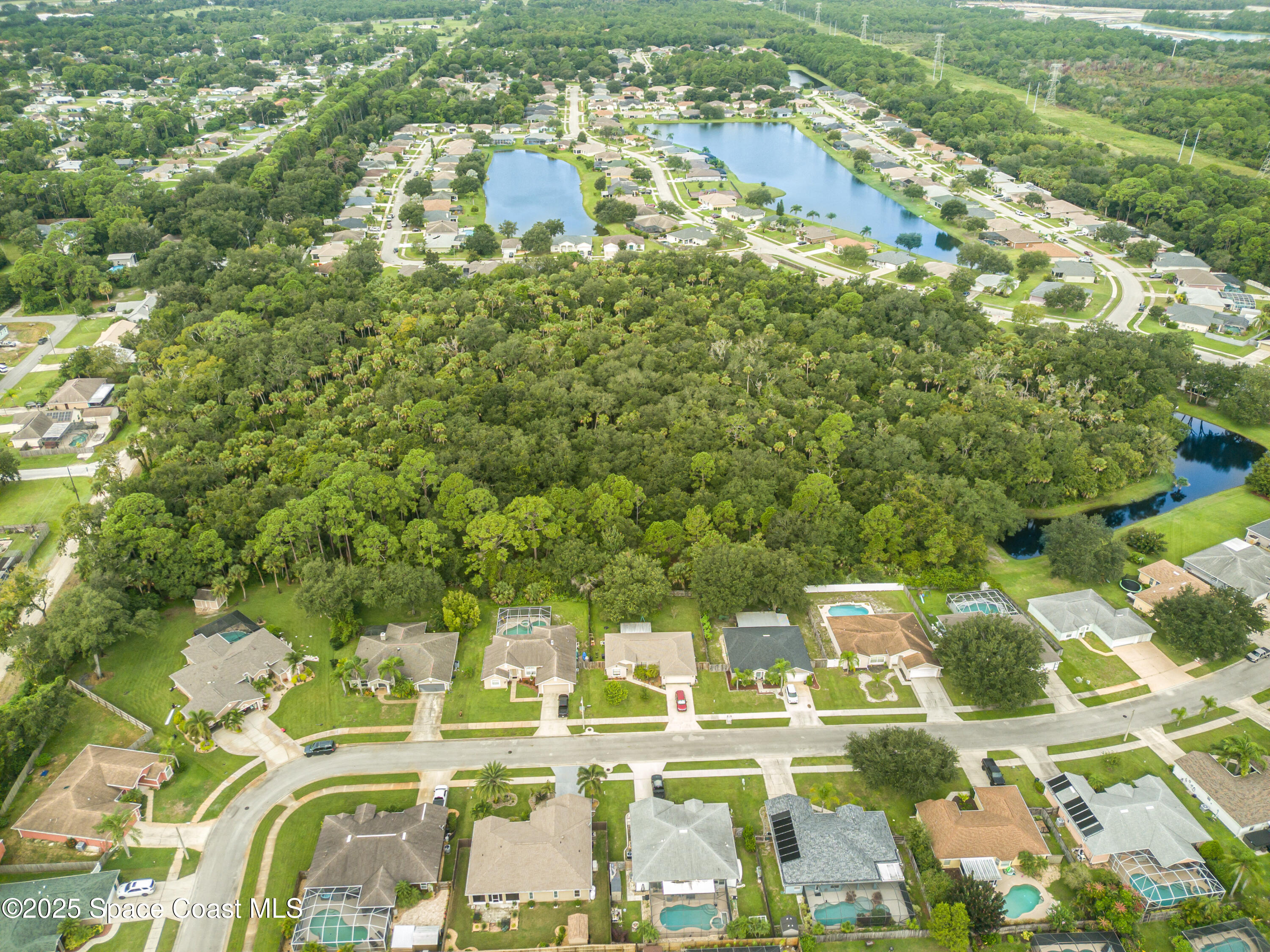 0 Unknown Street Cocoa, FL 32927 - Photo 1 of 13 a view of residential houses with outdoor space