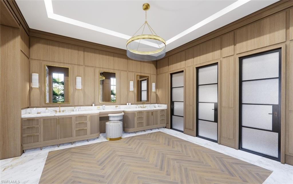 616 Bougainvillea Road Naples, FL 34102 - Photo 11 of 21 Full bath with double vanity and wooden walls