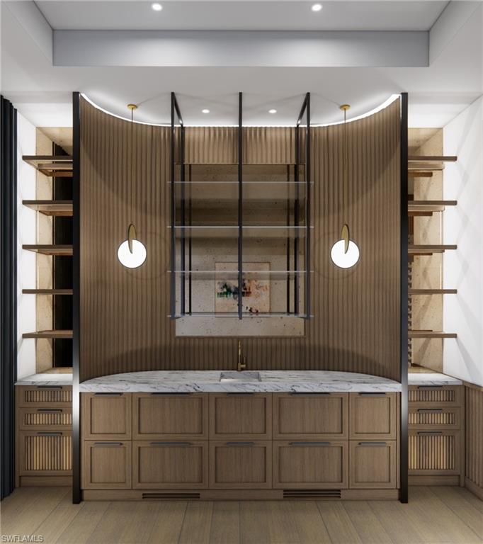 616 Bougainvillea Road Naples, FL 34102 - Photo 15 of 21 Bathroom with wood finished floors and recessed lighting