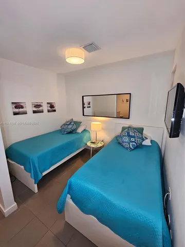 a view of a swimming pool with a yard