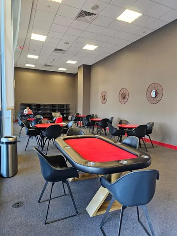 an aerial view of a house with swimming pool and outdoor space