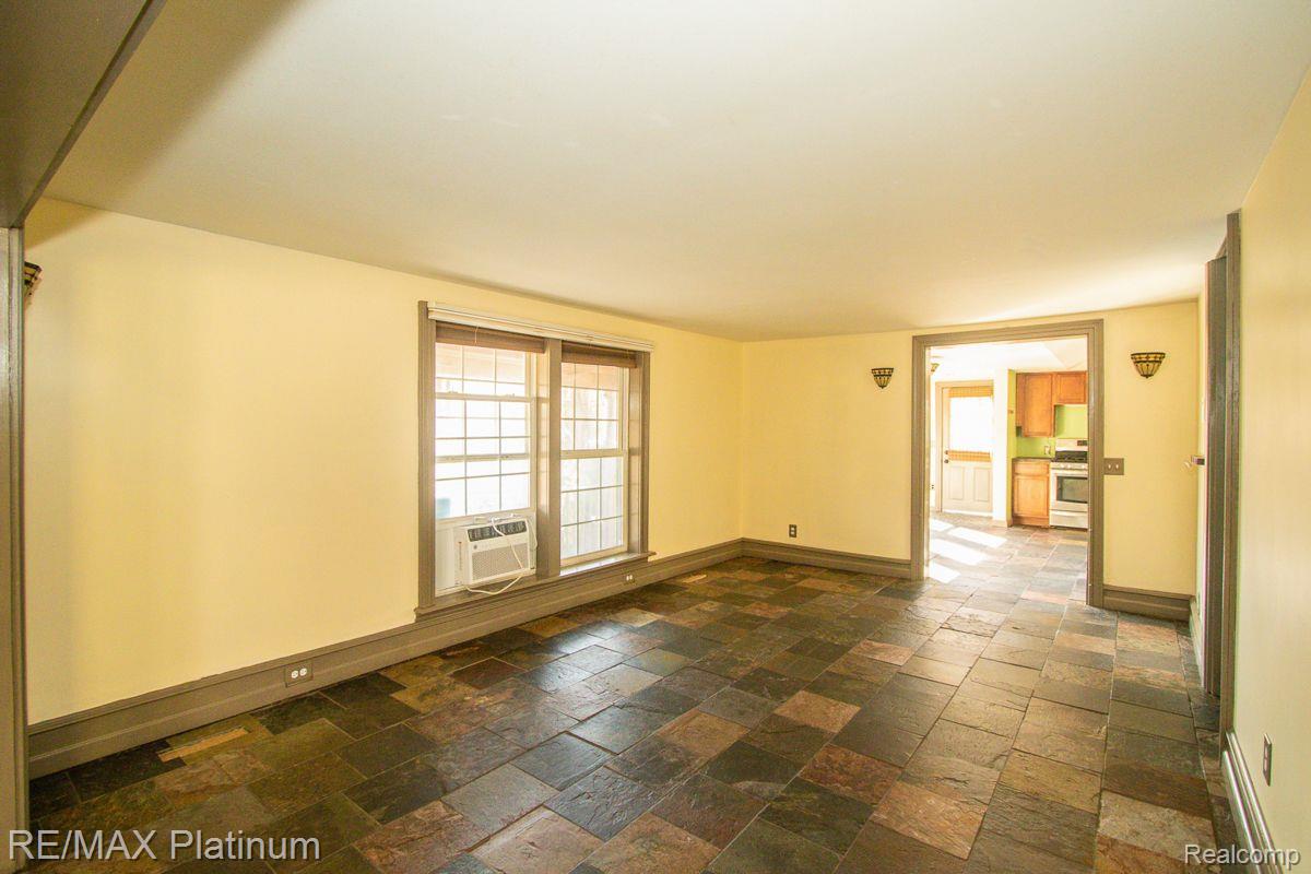 10944 Tuttle Hill Road Willis, MI 48191 - Photo 8 of 30 Living Room w In-Floor Radiant Heating