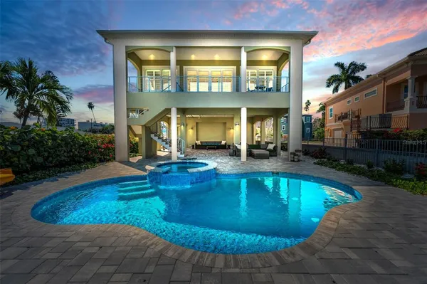 a view of a house with swimming pool
