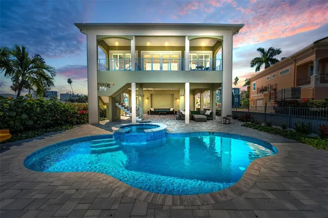 a view of a house with swimming pool