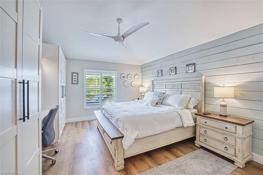 3700 Kent Drive Naples, FL 34112 - Photo 12 of 31 a bedroom with a bed and a window