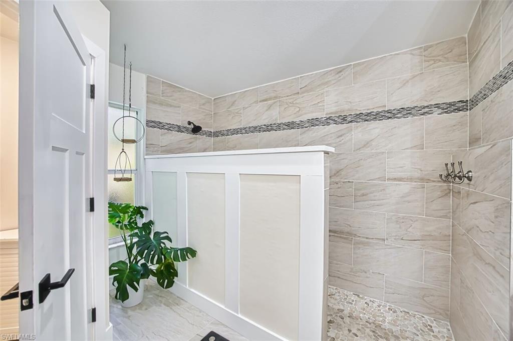 3700 Kent Drive Naples, FL 34112 - Photo 15 of 31 a bathroom with a shower