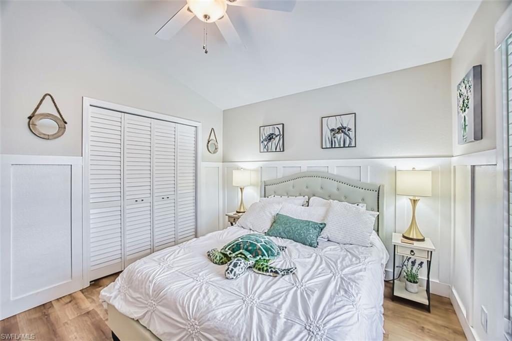 3700 Kent Drive Naples, FL 34112 - Photo 20 of 31 a bedroom with a bed and a window