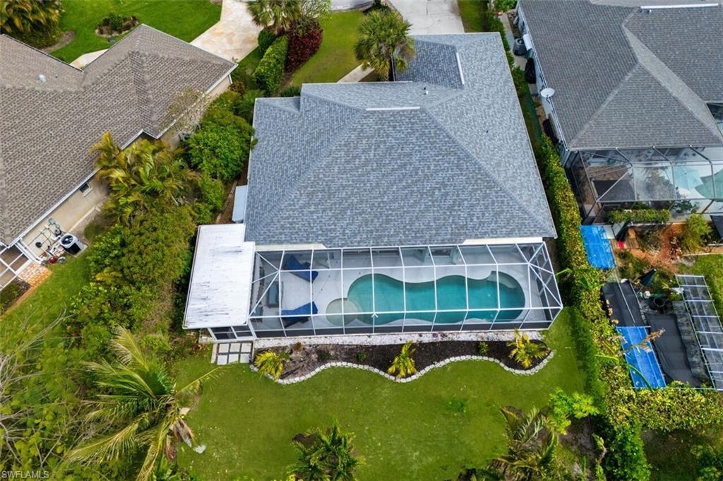 3700 Kent Drive Naples, FL 34112 - Photo 30 of 31 an aerial view of a house with a yard