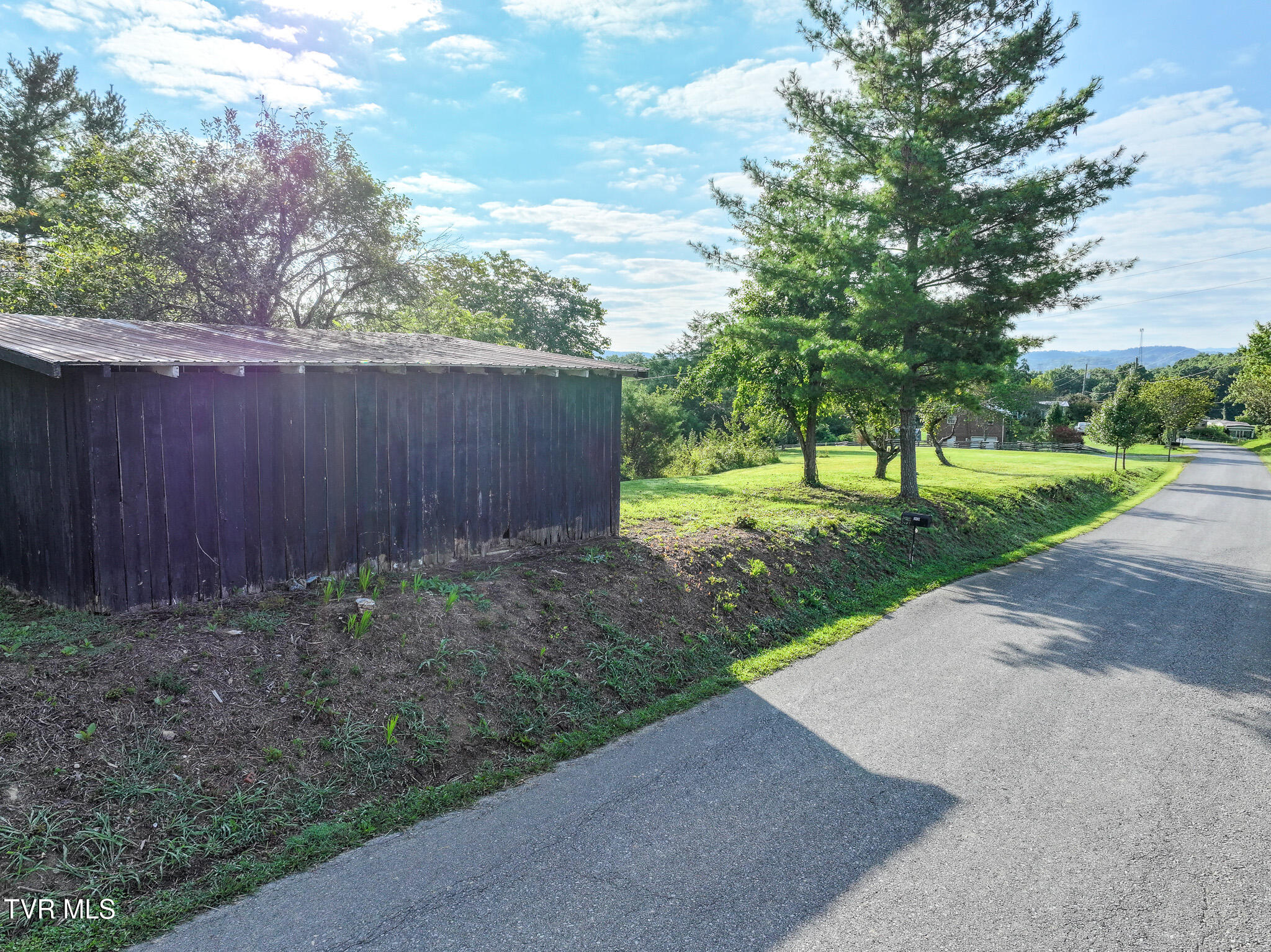 2395 Fodderstack Mountain Loop Greeneville, TN 37745 - Photo 36 of 51 DJI_20250910051900_0905_D-Edit