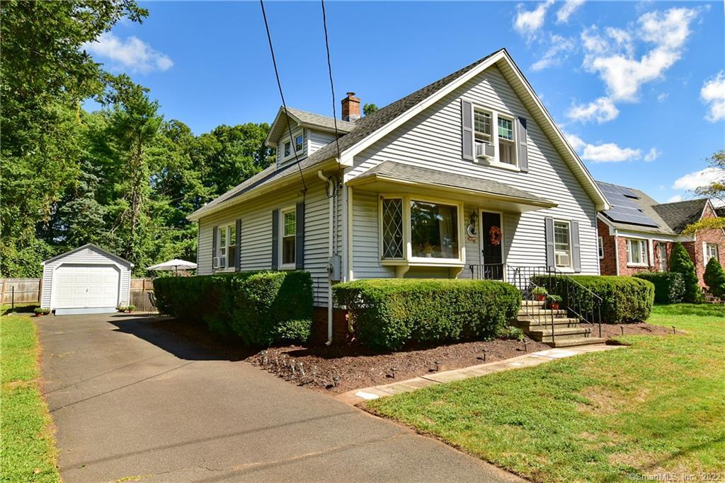 306 Strong Road South Windsor, CT 06074 - Photo 1 of 1 a front view of a house with a yard