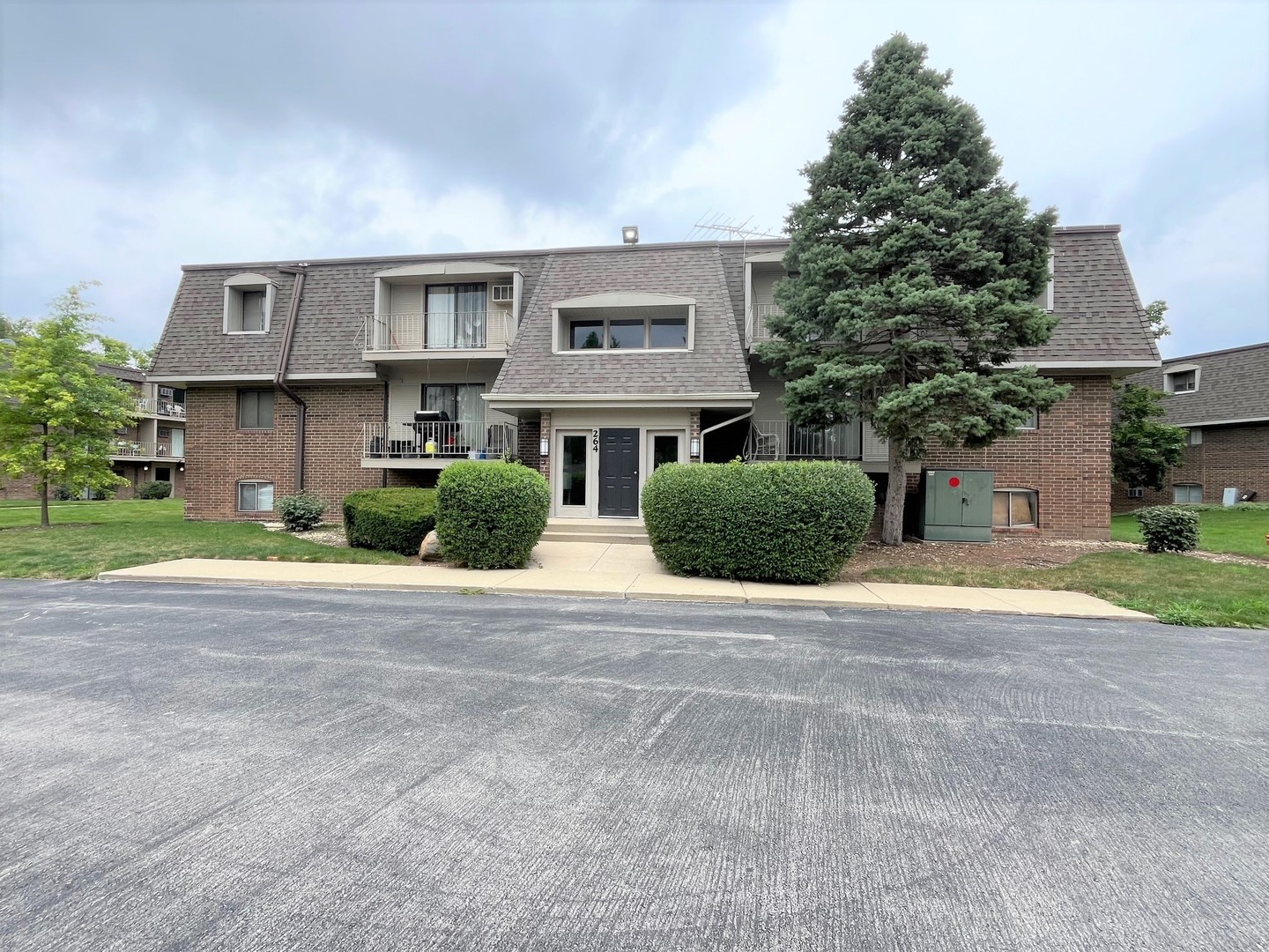 264 East Bailey Road, Unit G Naperville, IL 60565 - Photo 1 of 9 a house view with a outdoor space