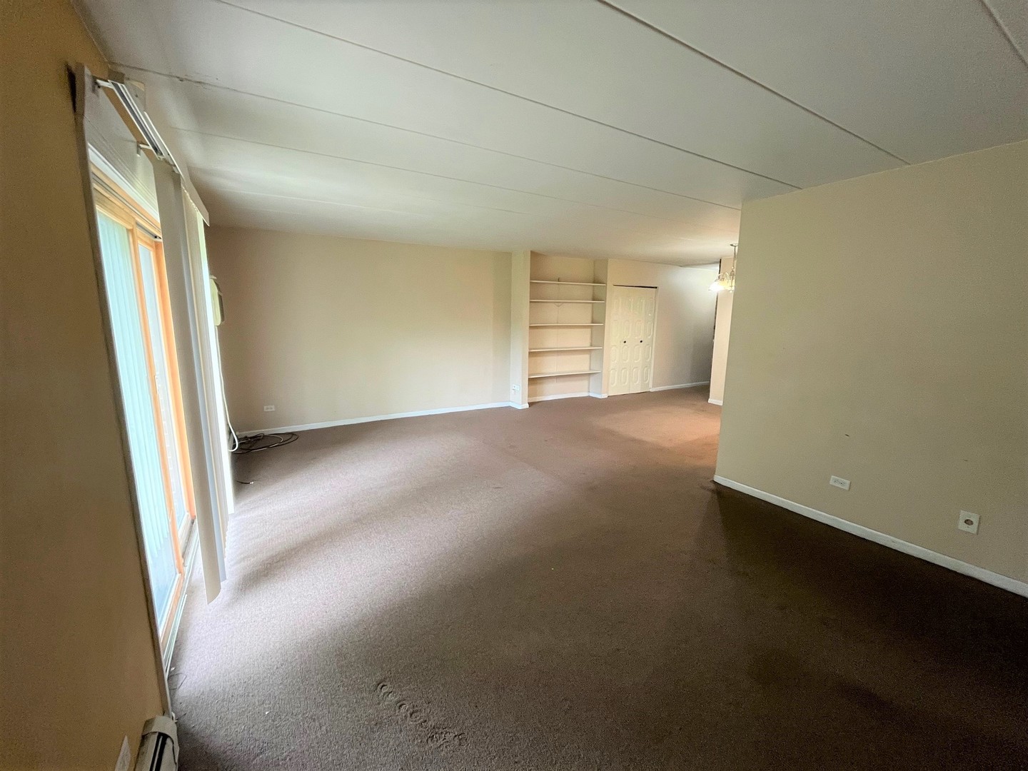 264 East Bailey Road, Unit G Naperville, IL 60565 - Photo 5 of 9 an empty room with windows