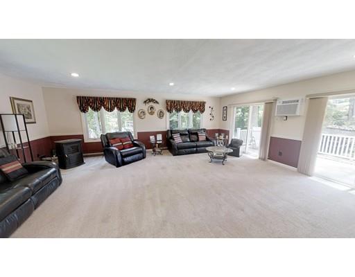 14 Upland Road Atkinson, NH 03811 - Photo 11 of 36 a living room with furniture and a large window