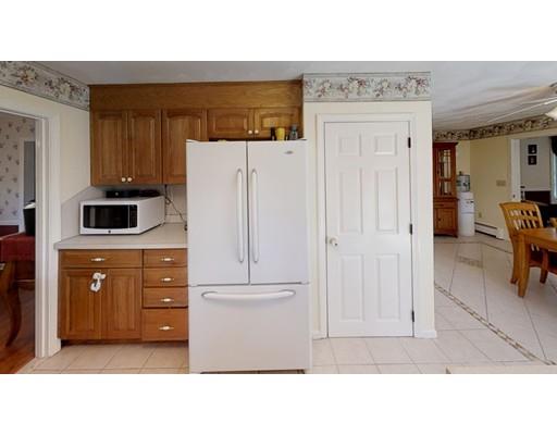 14 Upland Road Atkinson, NH 03811 - Photo 3 of 36 a kitchen with white cabinets