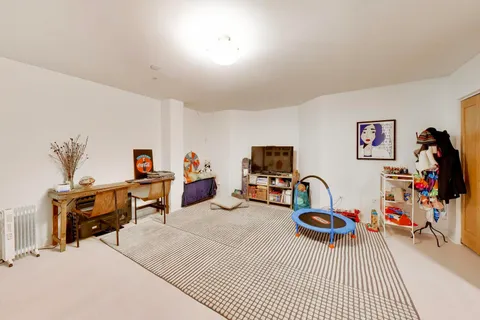 a view of a workspace with furniture