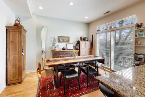 a view of a dining room with furniture