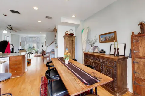 a view of a living room and dining room