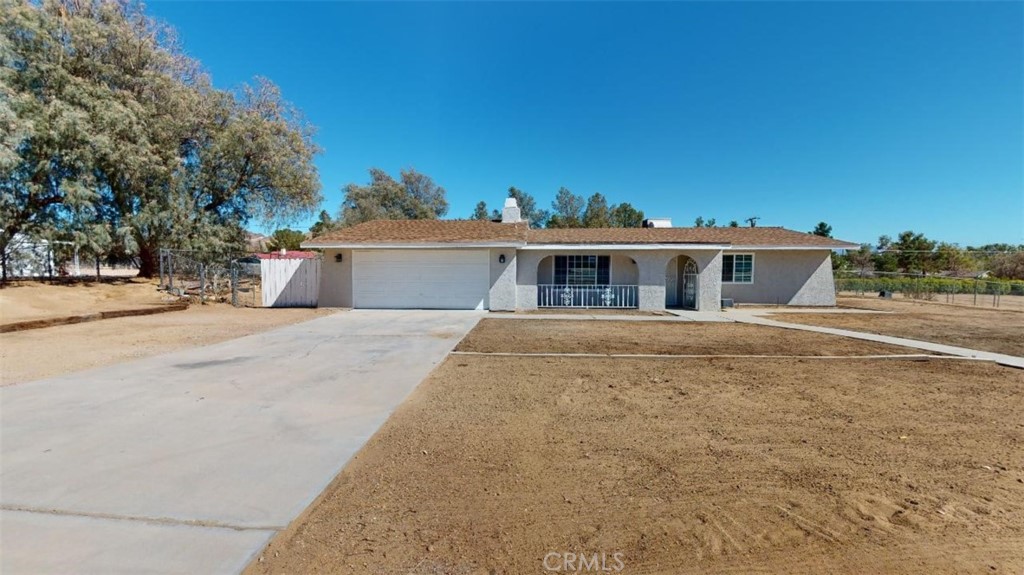 15955 Venango Road Apple Valley, CA 92307 - Photo 1 of 1 front view of a house with a street