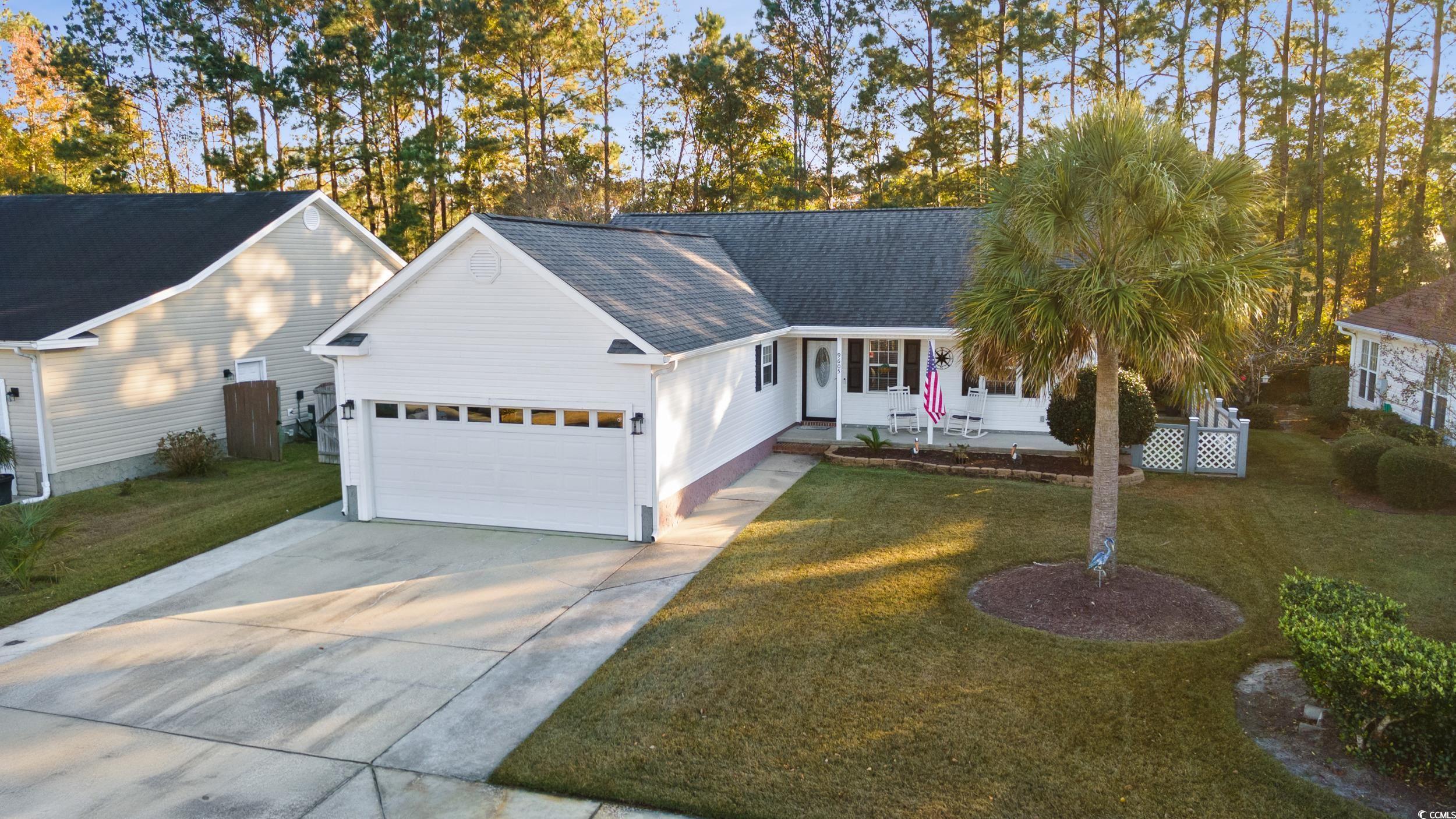 9605 Sullivan Drive Murrells Inlet, SC 29576 - Photo 1 of 40 Single story home featuring a garage and a front l