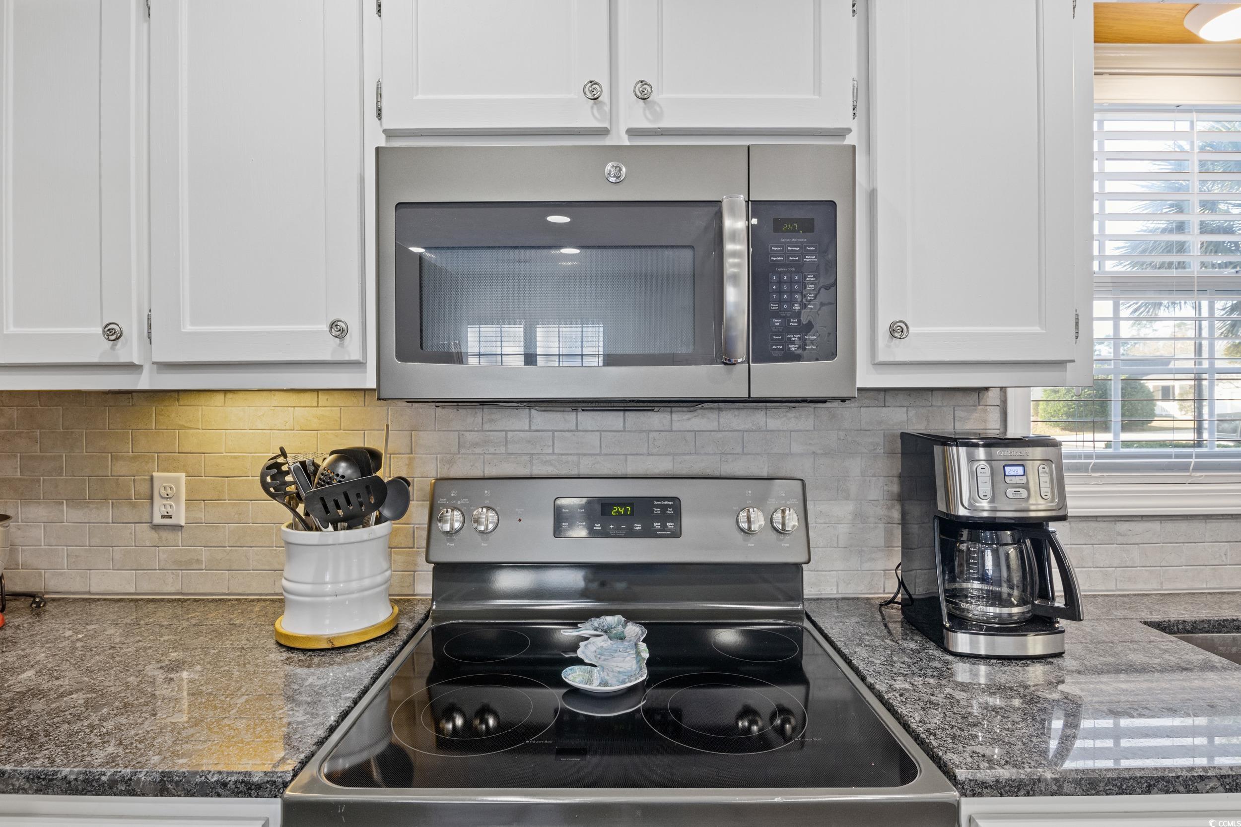 9605 Sullivan Drive Murrells Inlet, SC 29576 - Photo 21 of 40 Kitchen featuring backsplash, stainless steel appl