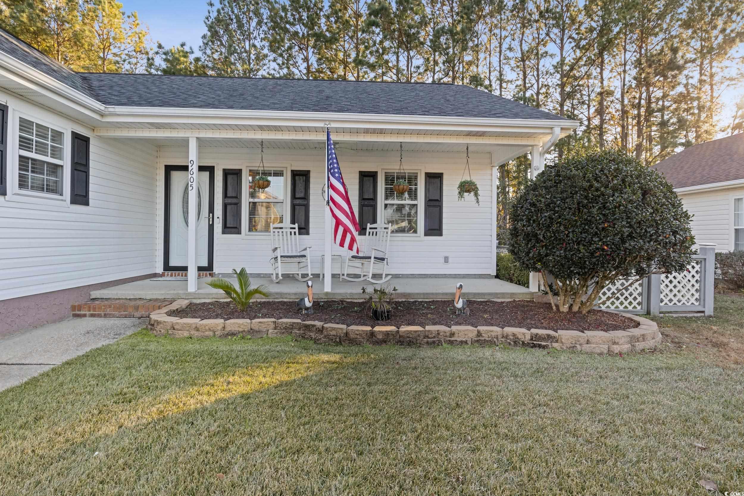 9605 Sullivan Drive Murrells Inlet, SC 29576 - Photo 5 of 40 View of front of house featuring a porch and a fro