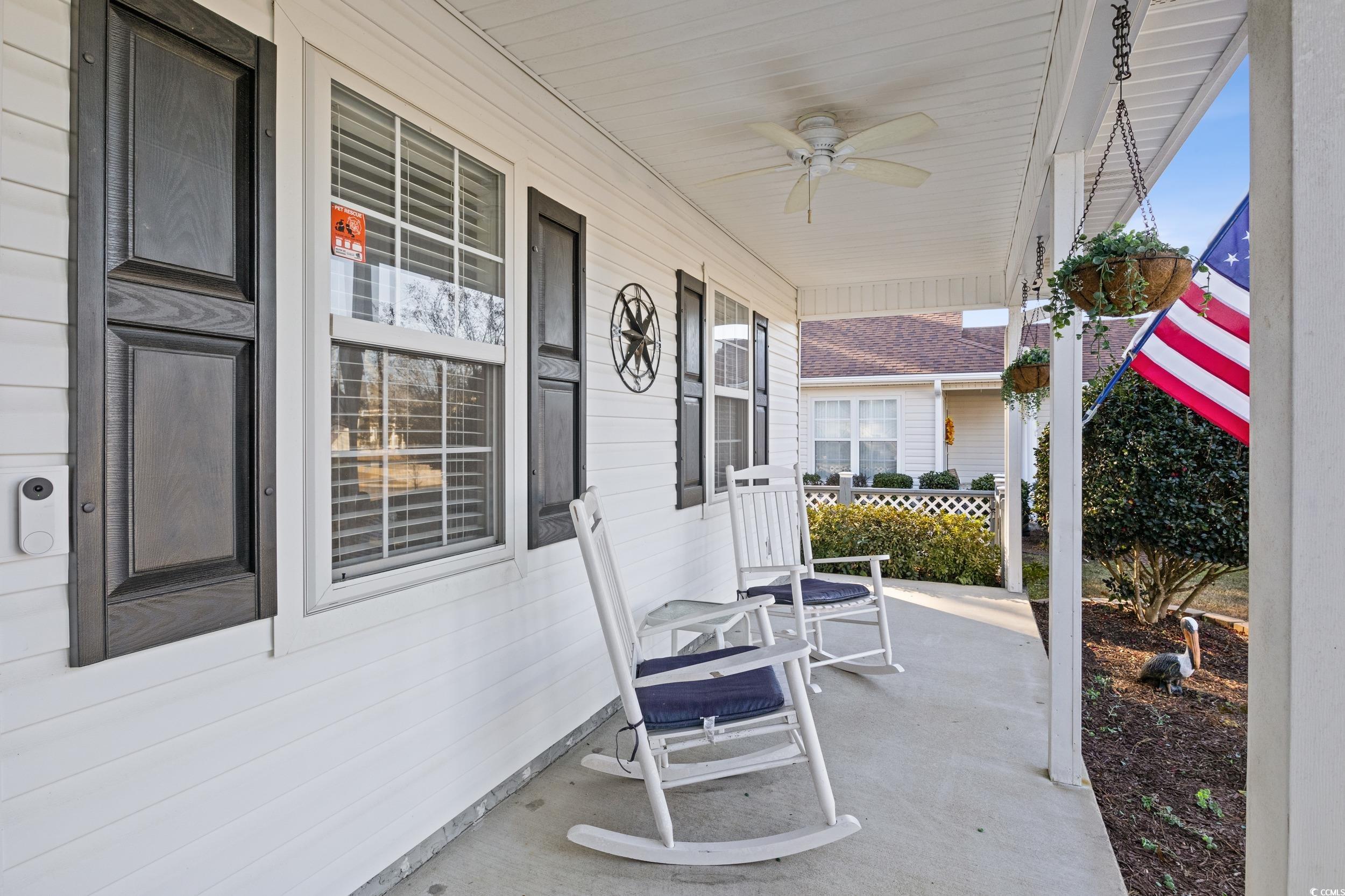 9605 Sullivan Drive Murrells Inlet, SC 29576 - Photo 7 of 40 View of patio featuring ceiling fan